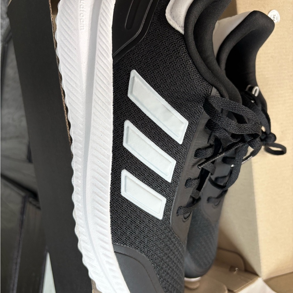 Adidas Black and White Sneakers with Sleek Design